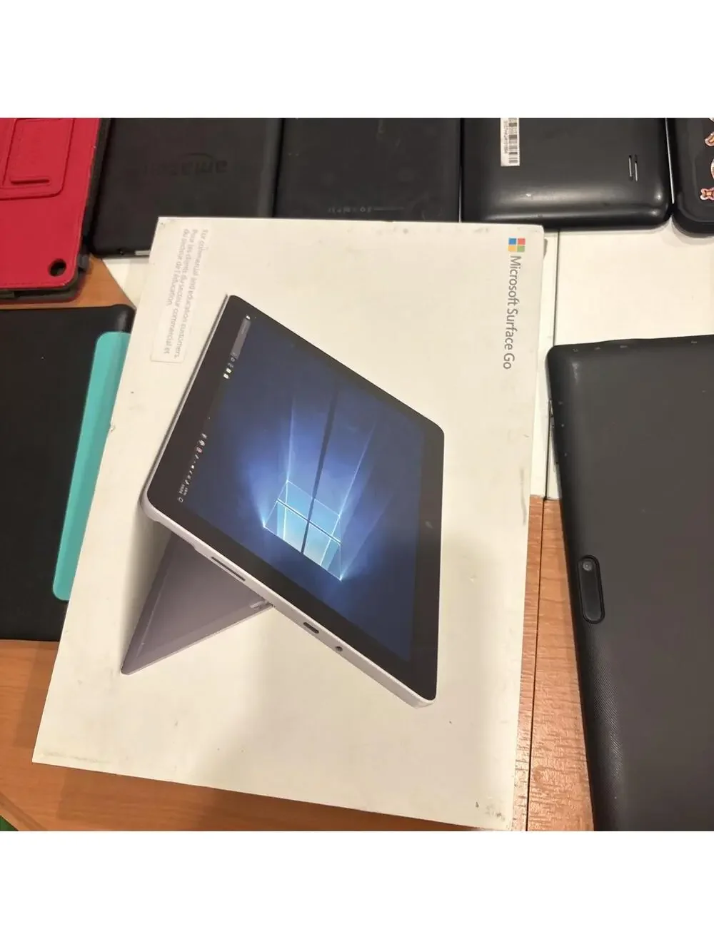 Lot Of 5 Android Tablets, 1 Surface Go, Bluetooth Keyboard & Cases For Part